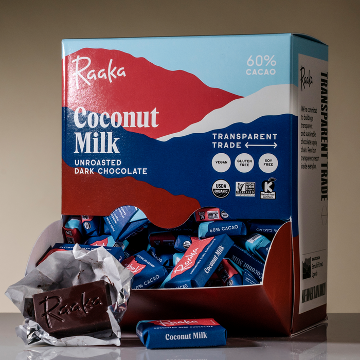 Coconut Milk Minis (Box of 100) with open mini wrapper - Raaka Chocolate