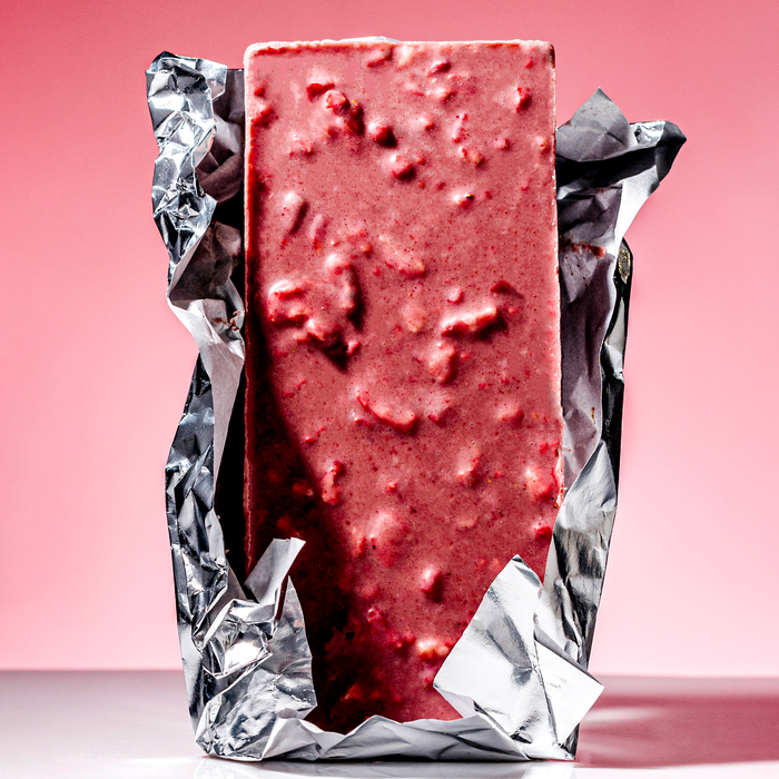 Raaka Strawberry & Cream bar open in foil, backside