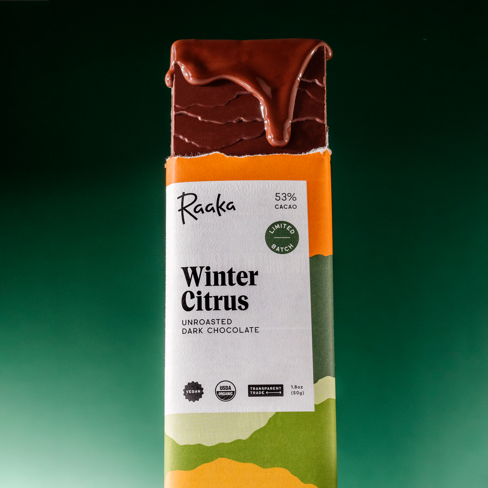 Raaka Chocolate Winter Citrus bar with dripping chocolate