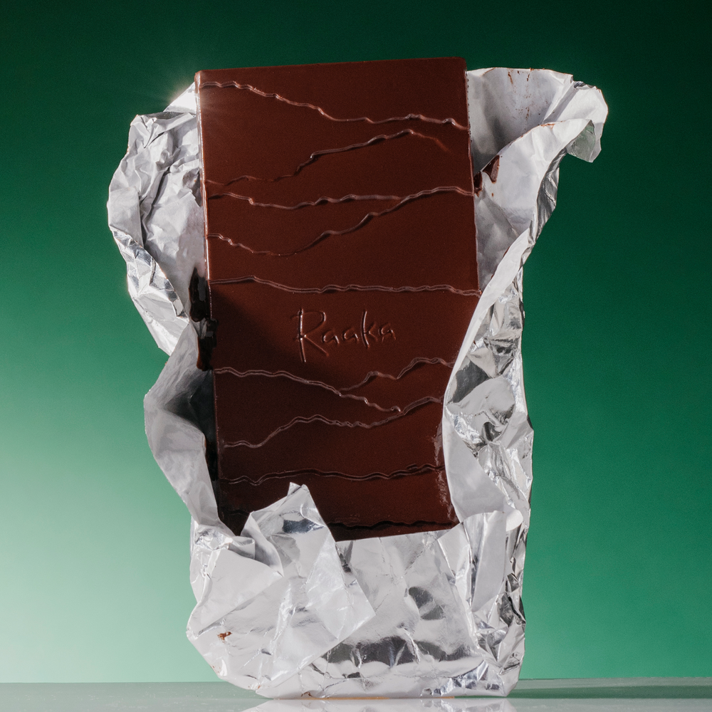 Raaka Chocolate Winter Citrus bar with open foil