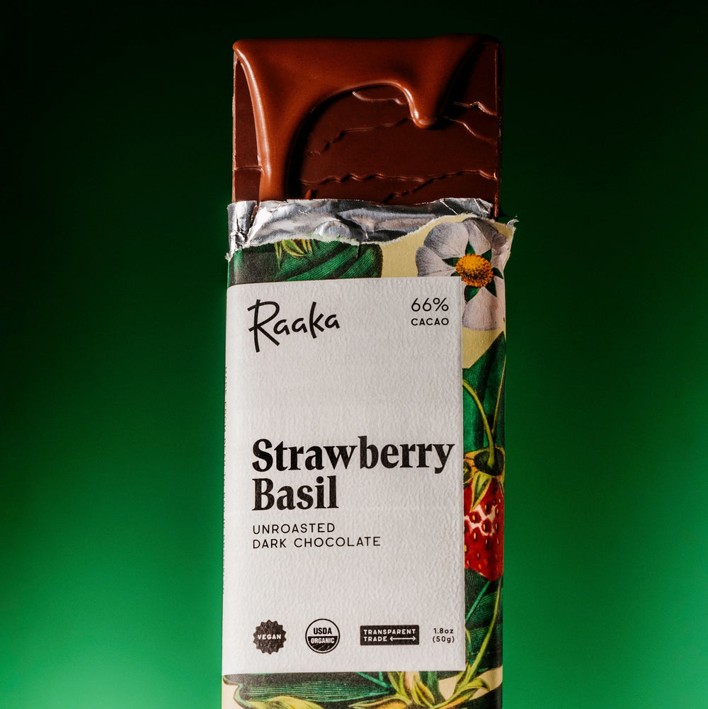 Strawberry Basil chocolate bar with open wrapper - Raaka Chocolate Botanical Collection